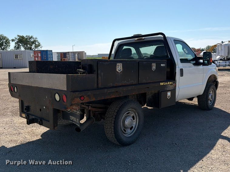 image for item EA4910 2011 Ford F250 Super Duty flatbed pickup truck