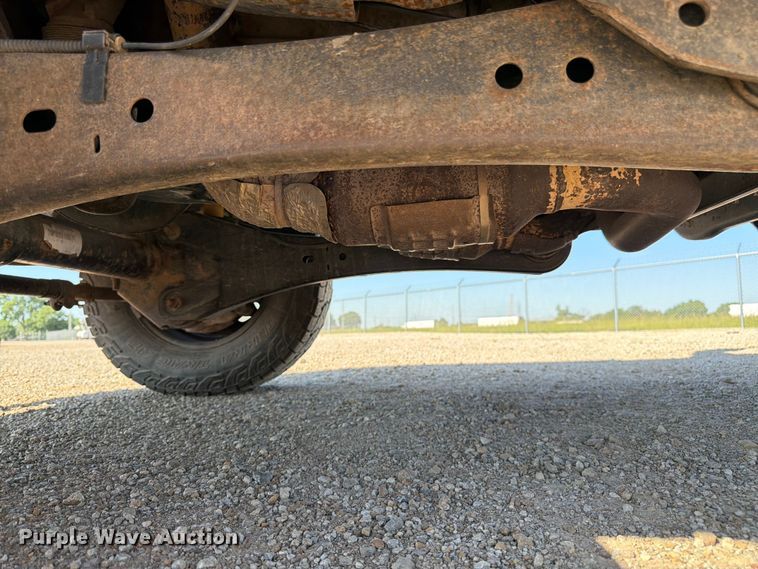 image for item EA4910 2011 Ford F250 Super Duty flatbed pickup truck