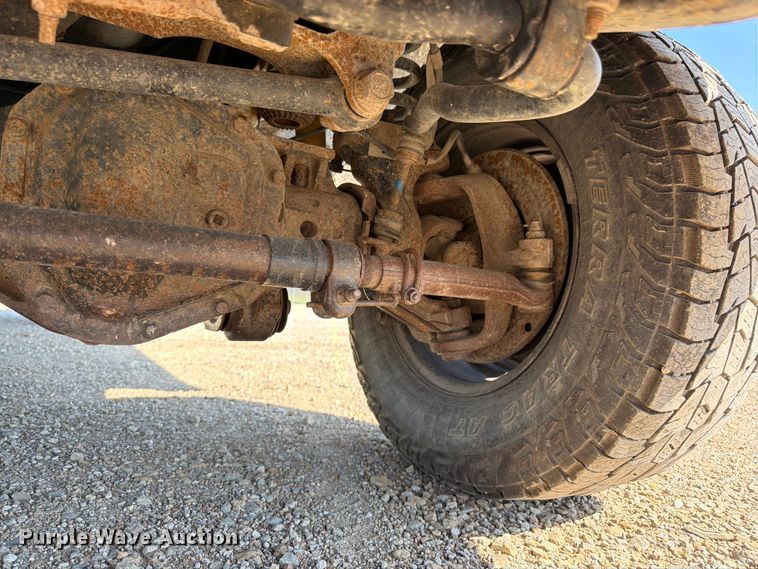 image for item EA4910 2011 Ford F250 Super Duty flatbed pickup truck