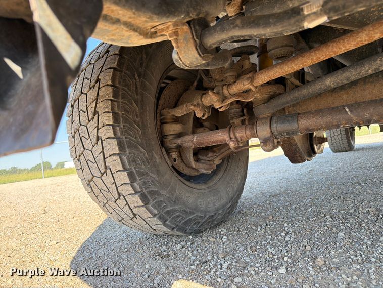 image for item EA4910 2011 Ford F250 Super Duty flatbed pickup truck