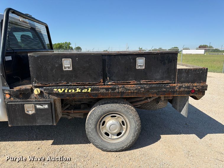 image for item EA4910 2011 Ford F250 Super Duty flatbed pickup truck