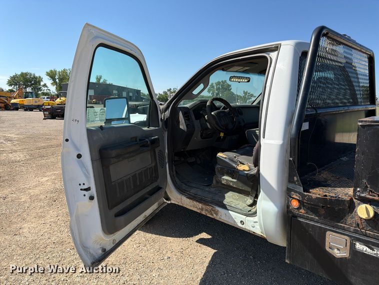 image for item EA4910 2011 Ford F250 Super Duty flatbed pickup truck