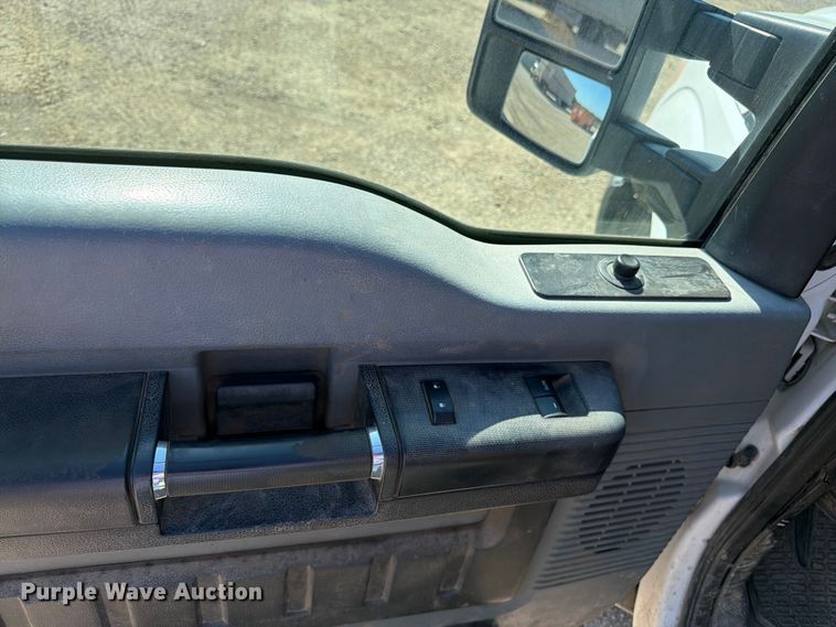 image for item EA4910 2011 Ford F250 Super Duty flatbed pickup truck