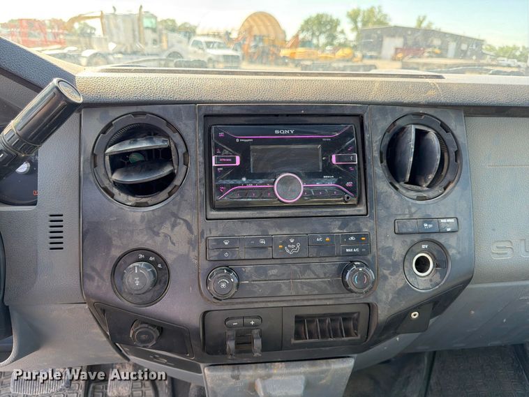 image for item EA4910 2011 Ford F250 Super Duty flatbed pickup truck