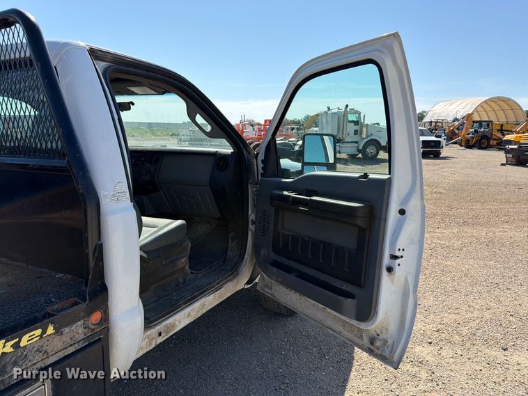 image for item EA4910 2011 Ford F250 Super Duty flatbed pickup truck