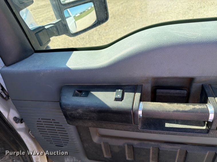 image for item EA4910 2011 Ford F250 Super Duty flatbed pickup truck
