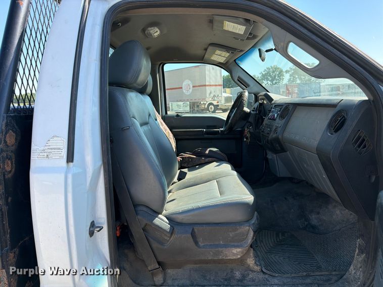 image for item EA4910 2011 Ford F250 Super Duty flatbed pickup truck
