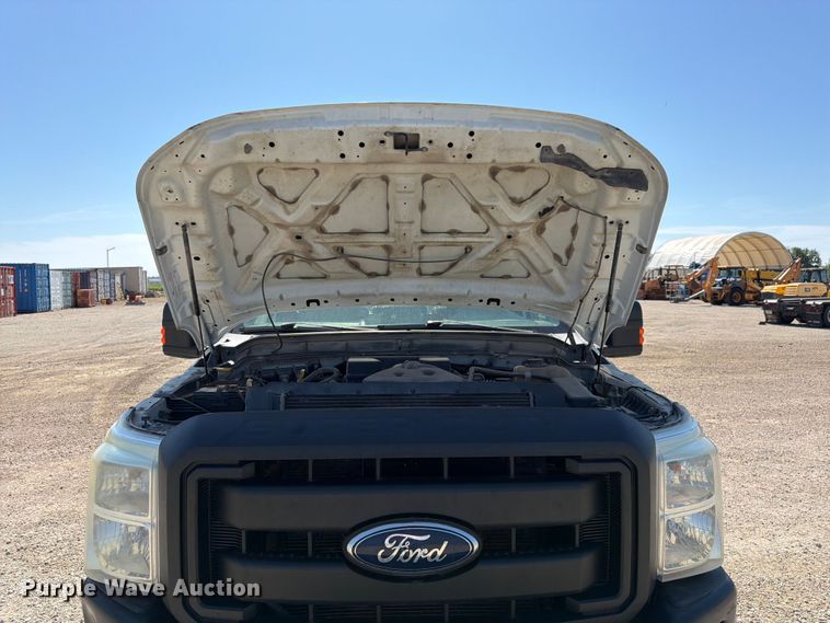 image for item EA4910 2011 Ford F250 Super Duty flatbed pickup truck