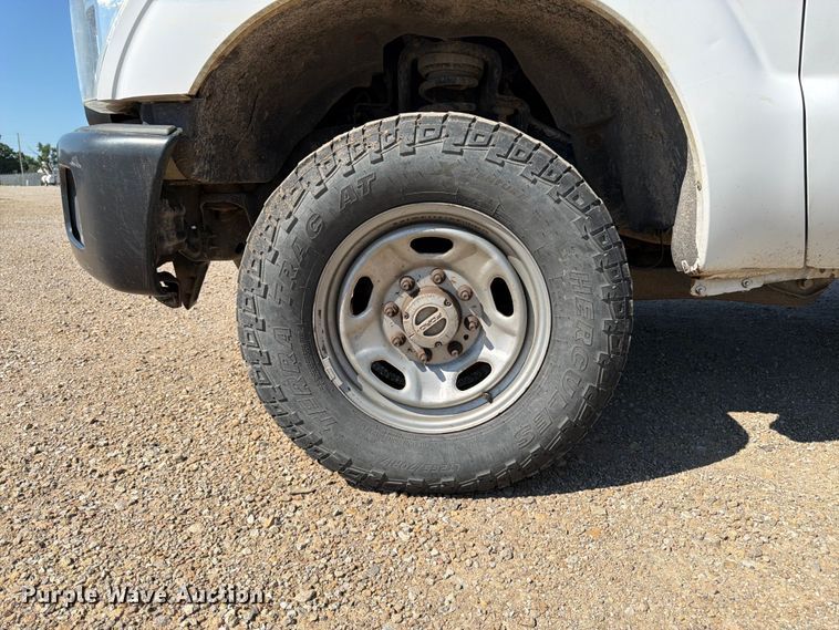 image for item EA4910 2011 Ford F250 Super Duty flatbed pickup truck