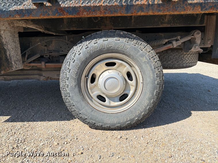 image for item EA4910 2011 Ford F250 Super Duty flatbed pickup truck