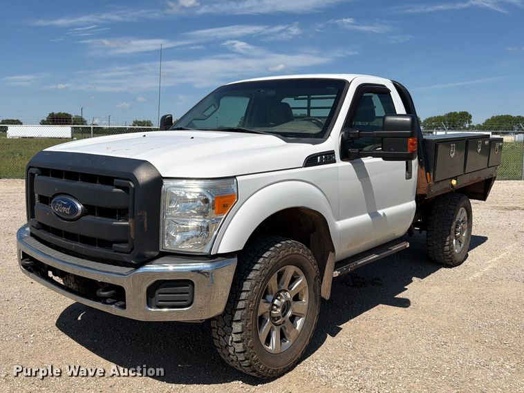 image for item EA4912 2015 Ford F250 Super Duty flatbed pickup truck