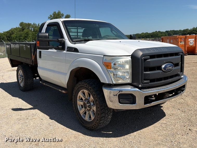 image for item EA4912 2015 Ford F250 Super Duty flatbed pickup truck