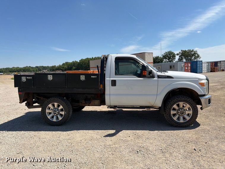 image for item EA4912 2015 Ford F250 Super Duty flatbed pickup truck