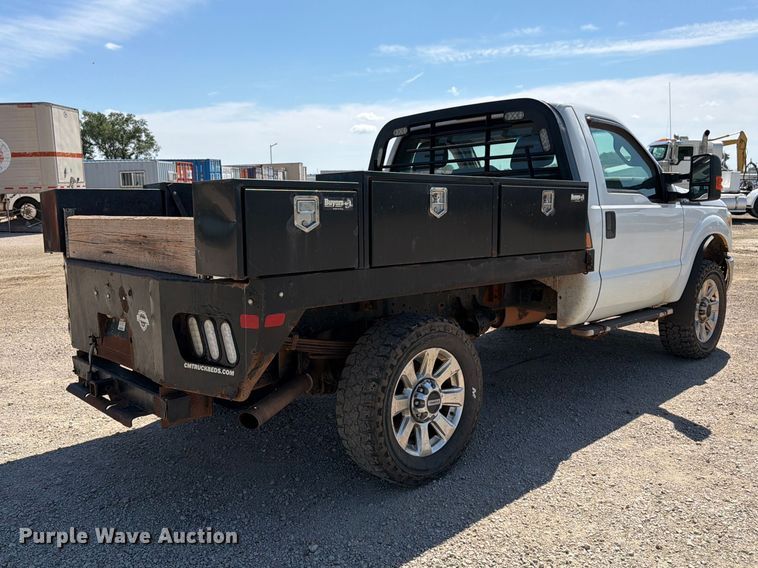 image for item EA4912 2015 Ford F250 Super Duty flatbed pickup truck