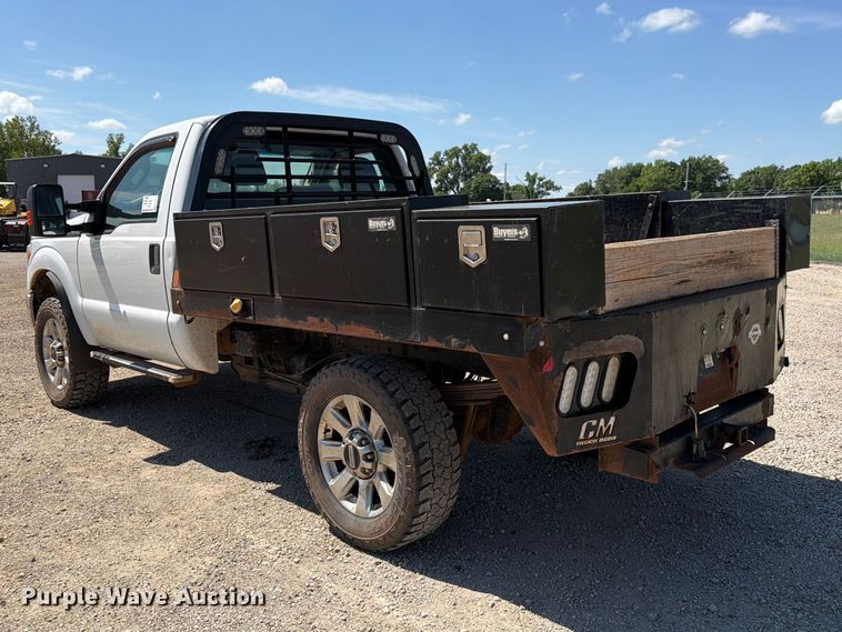 image for item EA4912 2015 Ford F250 Super Duty flatbed pickup truck