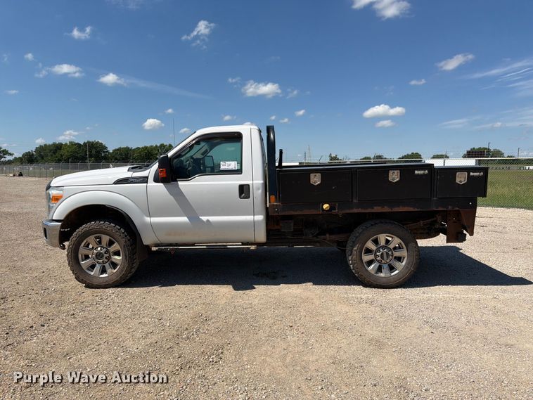 image for item EA4912 2015 Ford F250 Super Duty flatbed pickup truck