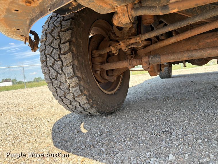 image for item EA4912 2015 Ford F250 Super Duty flatbed pickup truck