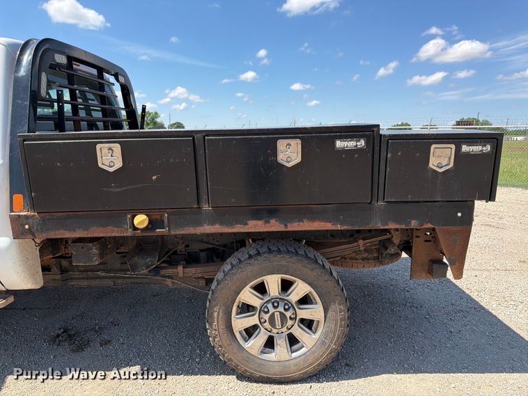 image for item EA4912 2015 Ford F250 Super Duty flatbed pickup truck