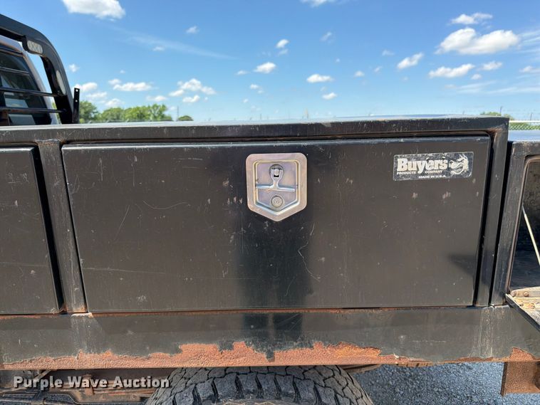 image for item EA4912 2015 Ford F250 Super Duty flatbed pickup truck