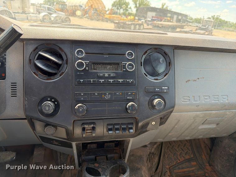 image for item EA4912 2015 Ford F250 Super Duty flatbed pickup truck