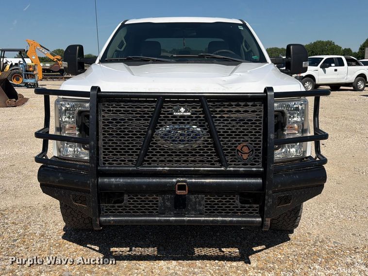 image for item EA4914 2019 Ford F250 Super Duty Crew Cab utility bed pickup truck