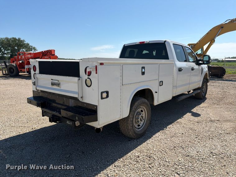 image for item EA4914 2019 Ford F250 Super Duty Crew Cab utility bed pickup truck