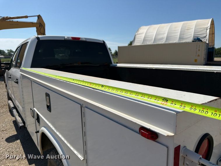 image for item EA4914 2019 Ford F250 Super Duty Crew Cab utility bed pickup truck