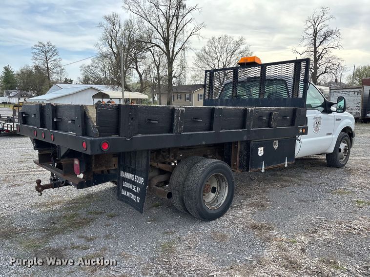 image for item EM0083 2006 Ford F350 Super Duty XL flatbed pickup truck