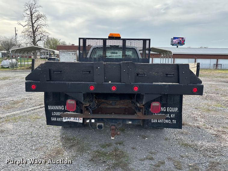 image for item EM0083 2006 Ford F350 Super Duty XL flatbed pickup truck