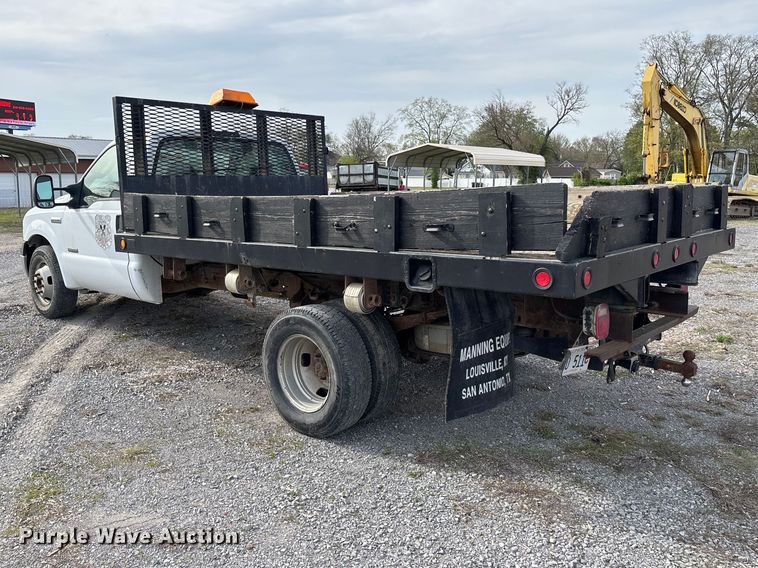 image for item EM0083 2006 Ford F350 Super Duty XL flatbed pickup truck