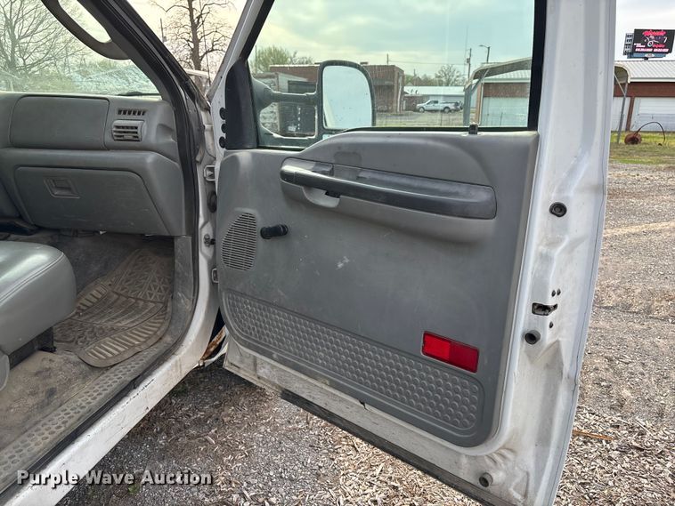 image for item EM0083 2006 Ford F350 Super Duty XL flatbed pickup truck