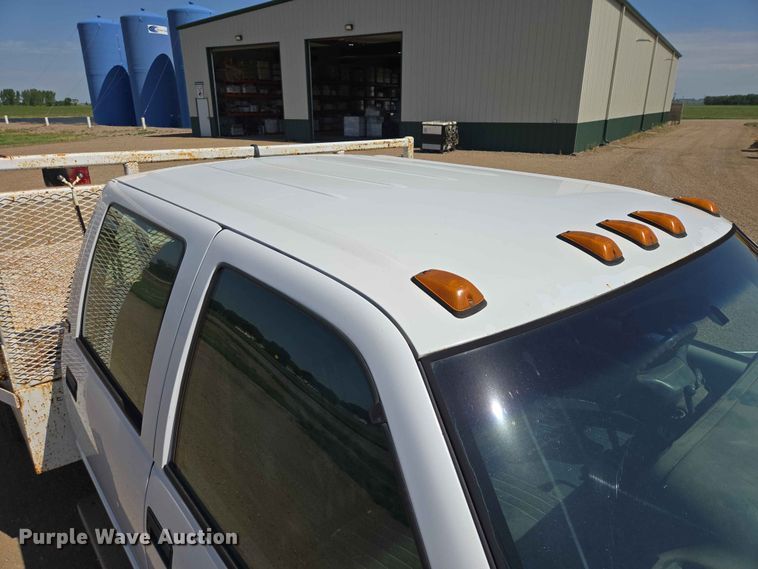 image for item ER1663 1996 GMC Sierra 3500 Crew Cab flatbed pickup truck