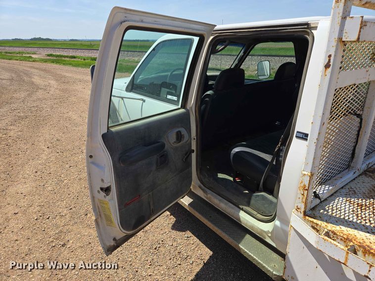 image for item ER1663 1996 GMC Sierra 3500 Crew Cab flatbed pickup truck