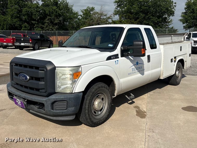 image for item EU5567 2015 Ford F250 Super Duty Ext. Cab flatbed pickup truck