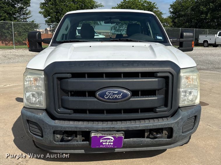image for item EU5567 2015 Ford F250 Super Duty Ext. Cab flatbed pickup truck