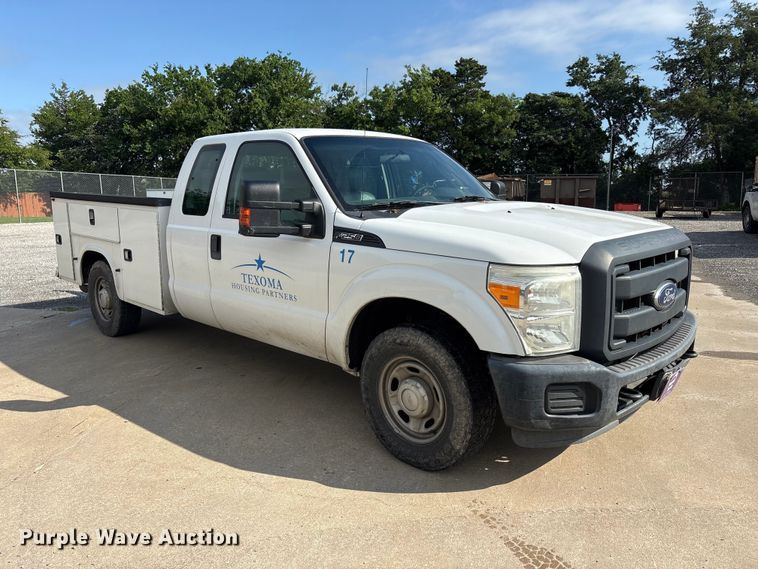 image for item EU5567 2015 Ford F250 Super Duty Ext. Cab flatbed pickup truck
