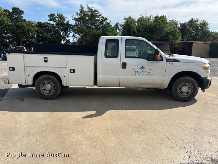 image for item EU5567 2015 Ford F250 Super Duty Ext. Cab flatbed pickup truck