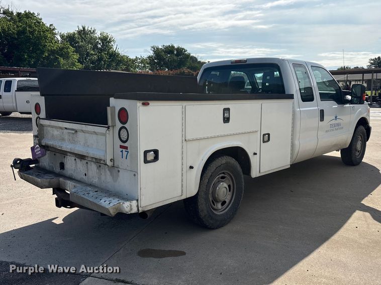 image for item EU5567 2015 Ford F250 Super Duty Ext. Cab flatbed pickup truck