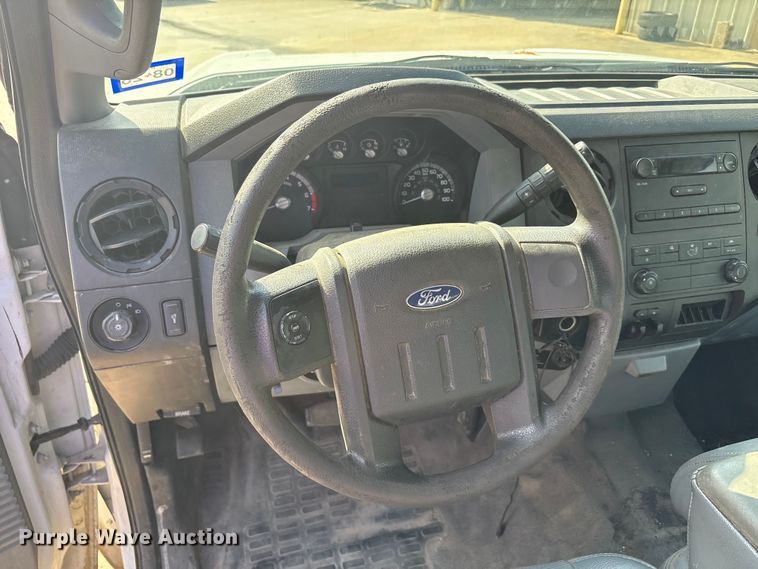 image for item EU5567 2015 Ford F250 Super Duty Ext. Cab flatbed pickup truck
