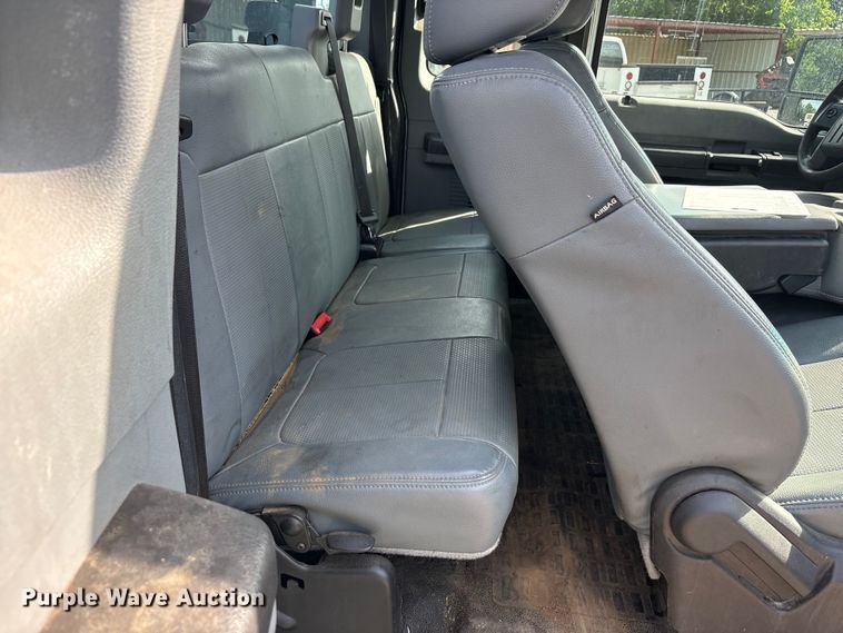 image for item EU5567 2015 Ford F250 Super Duty Ext. Cab flatbed pickup truck
