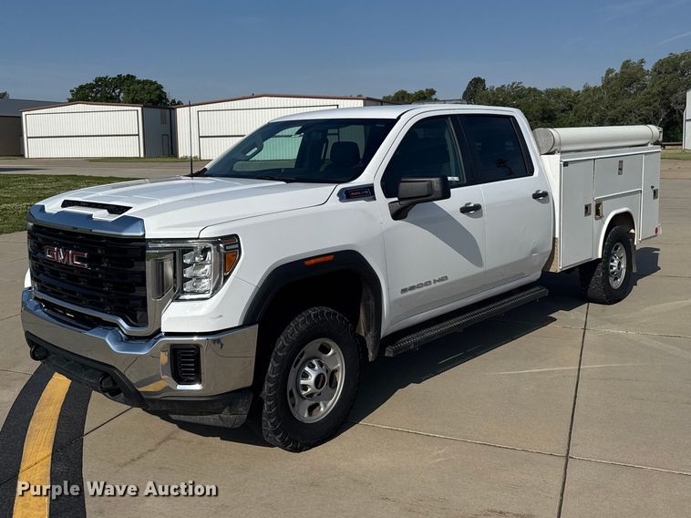 image for item FB7403 2023 GMC Sierra 2500HD Crew Cab utility bed pickup truck