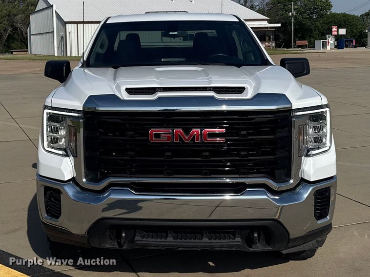 image for item FB7403 2023 GMC Sierra 2500HD Crew Cab utility bed pickup truck