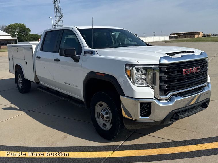 image for item FB7403 2023 GMC Sierra 2500HD Crew Cab utility bed pickup truck