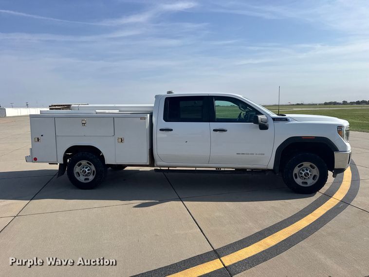 image for item FB7403 2023 GMC Sierra 2500HD Crew Cab utility bed pickup truck