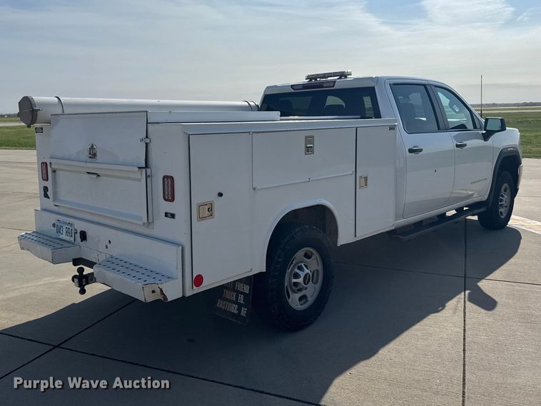 image for item FB7403 2023 GMC Sierra 2500HD Crew Cab utility bed pickup truck