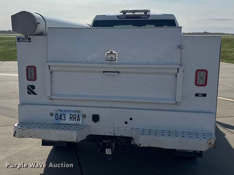 image for item FB7403 2023 GMC Sierra 2500HD Crew Cab utility bed pickup truck