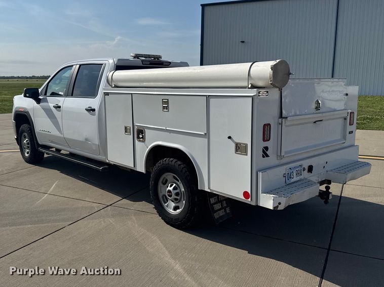 image for item FB7403 2023 GMC Sierra 2500HD Crew Cab utility bed pickup truck
