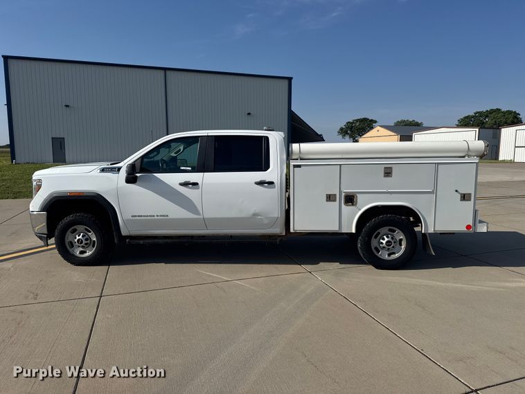 image for item FB7403 2023 GMC Sierra 2500HD Crew Cab utility bed pickup truck