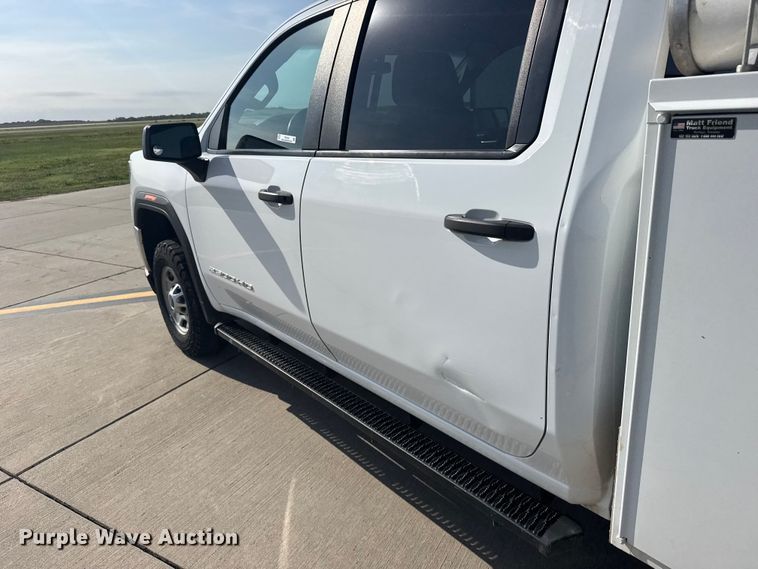 image for item FB7403 2023 GMC Sierra 2500HD Crew Cab utility bed pickup truck