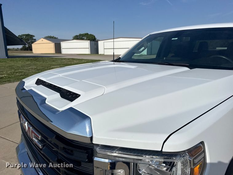 image for item FB7403 2023 GMC Sierra 2500HD Crew Cab utility bed pickup truck